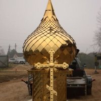 Освящение купола и накупольного креста для строящегося храма в микрорайоне Погораны